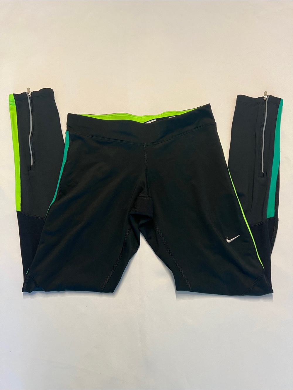 Nike Running - Black Dri-FIT Tights with Zippered waist band pocket. Size Small.